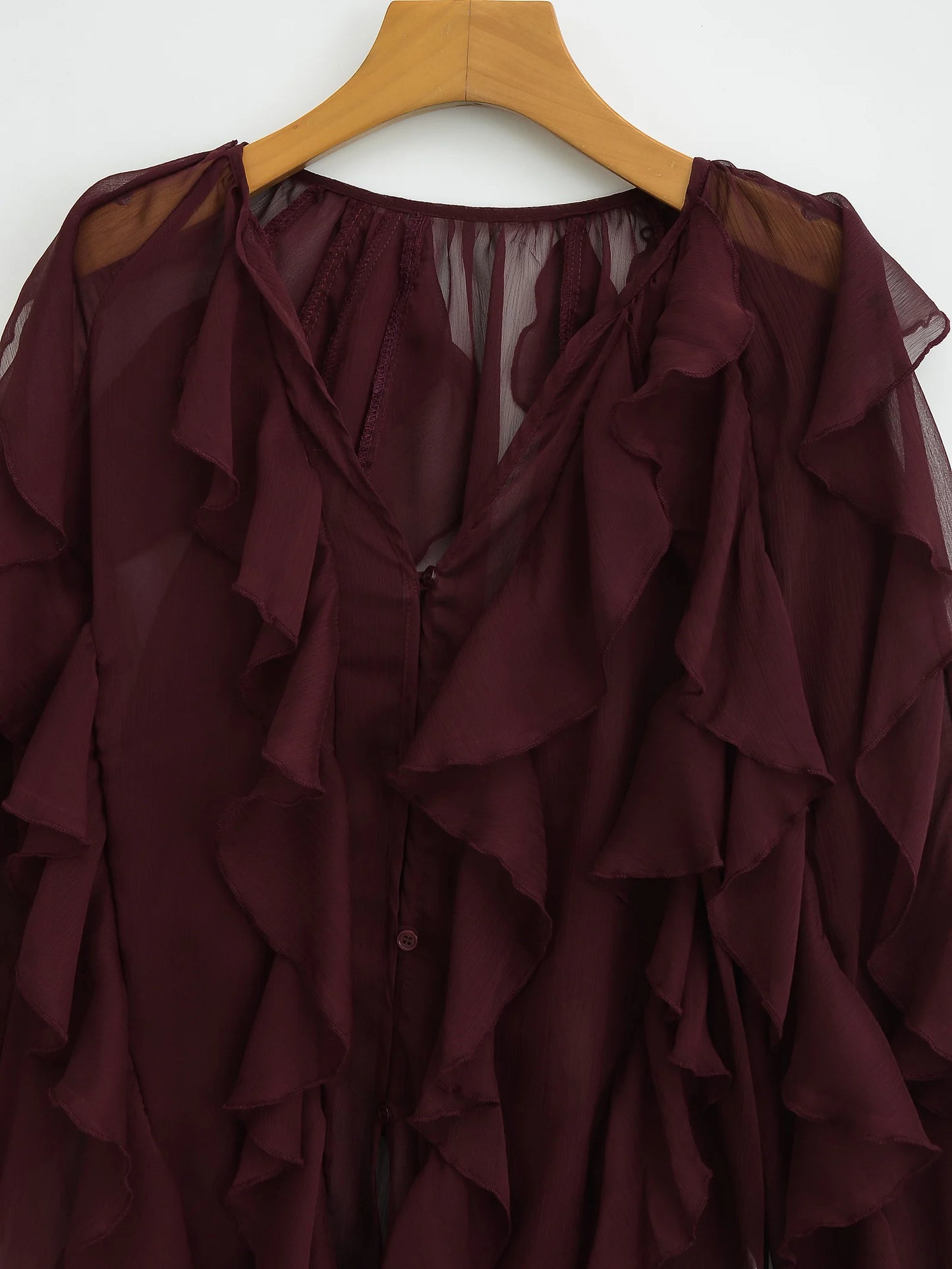 Blusa translúcida a la moda para mujer